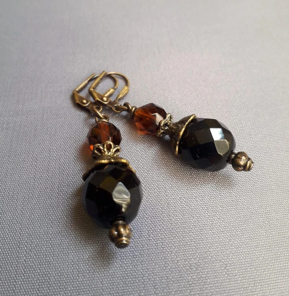 Akan - Black and topaz glass earrings