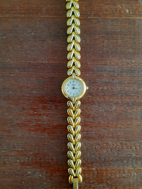 Montre à quartz de la marque YEMA bracelet doré