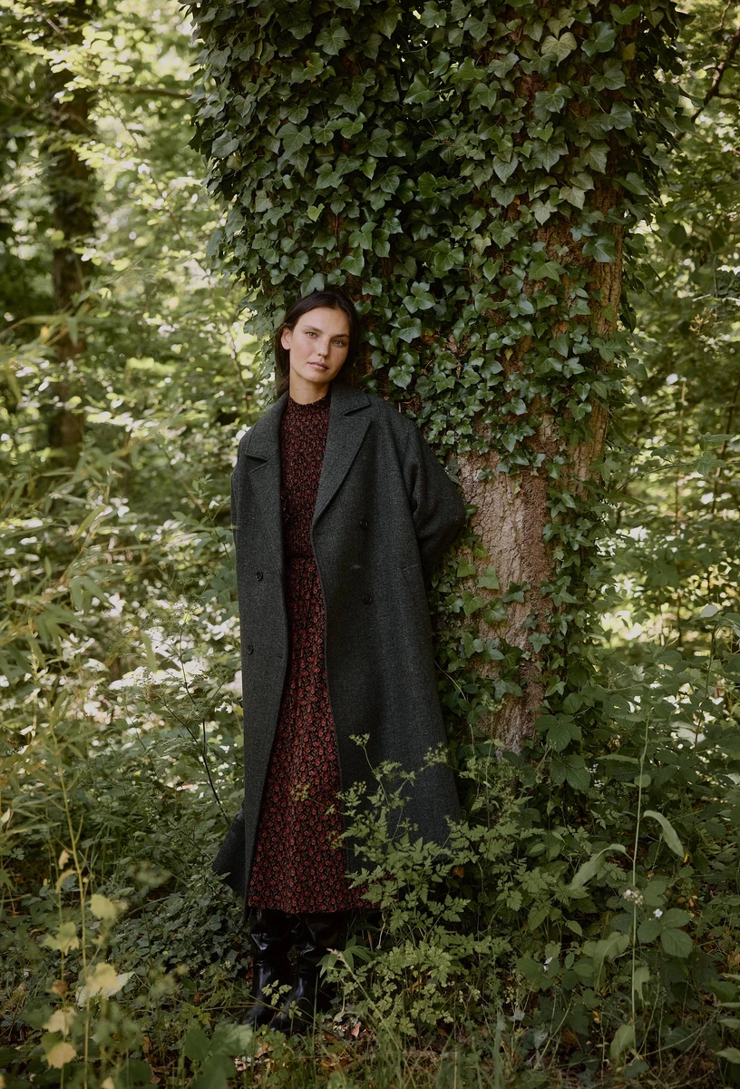 Manteau chevron double boutonnage contenant de la laine