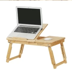 Plateau de lit et ordinateur