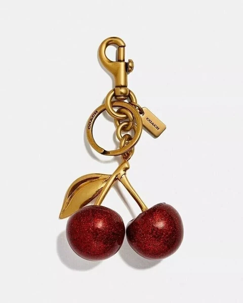 ™COACH™ Cherry Bag Charm KeyChain Glitter resin and metal Brass/Red Apple