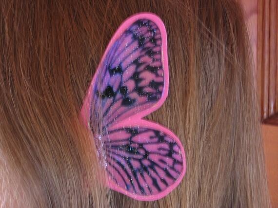 Ailes d&#39;oreille de papillon de bande rose