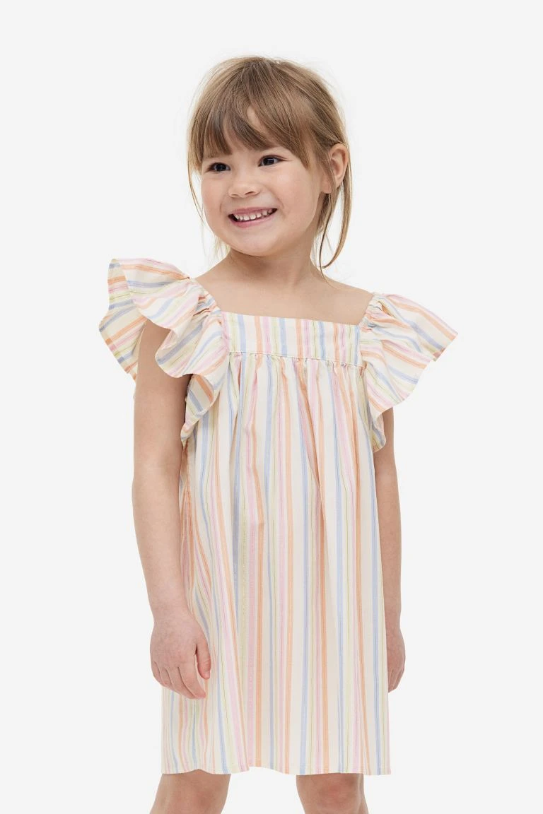 Robe à motif avec manches papillon