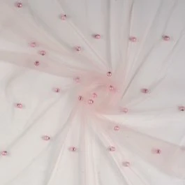 Tissu tulle rose pâle avec perles