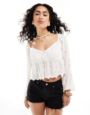 Hollister - Top à manches longues noué sur le devant - Blanc | ASOS
