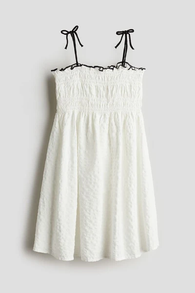 Robe à corsage smocké