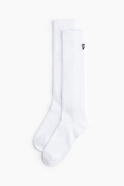 Chaussettes de sport tombantes