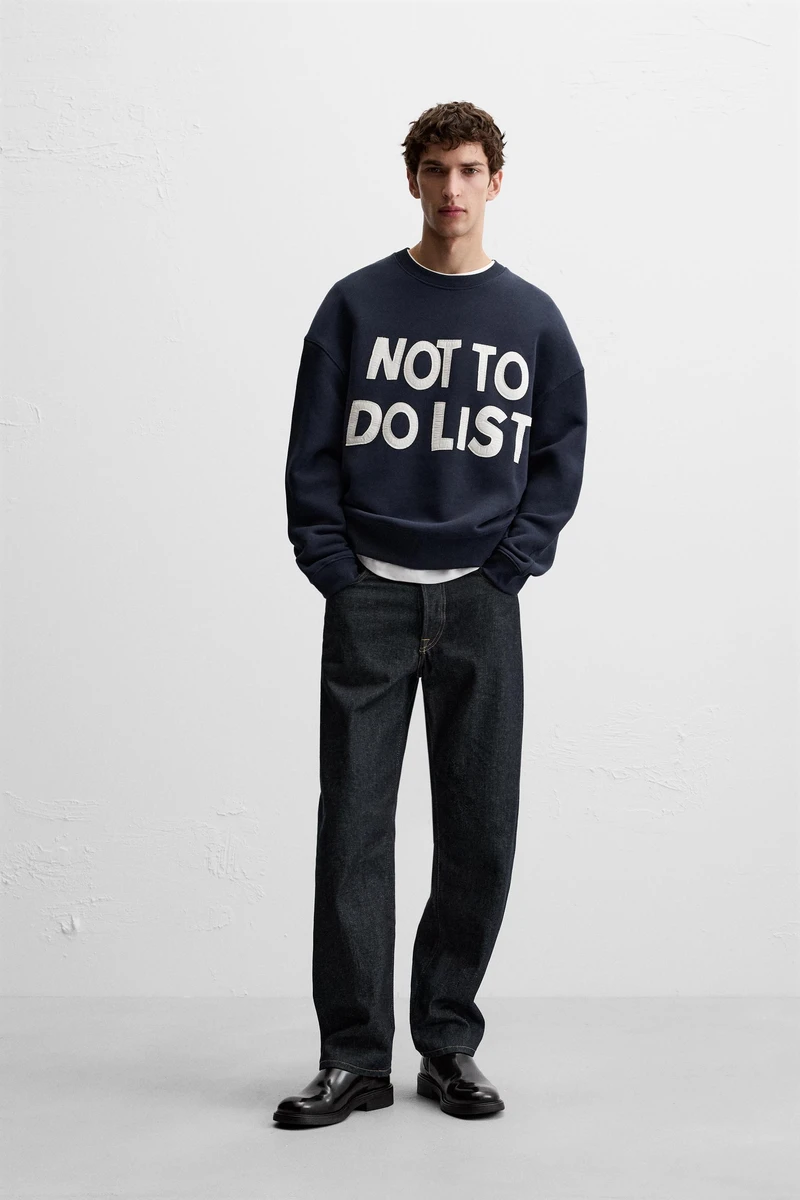 SWEAT À INSCRIPTION AVEC ÉCUSSONS