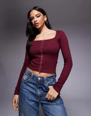 ASOS DESIGN - Top manches longues en coton nervuré avec fermeture à agrafes - Bordeaux