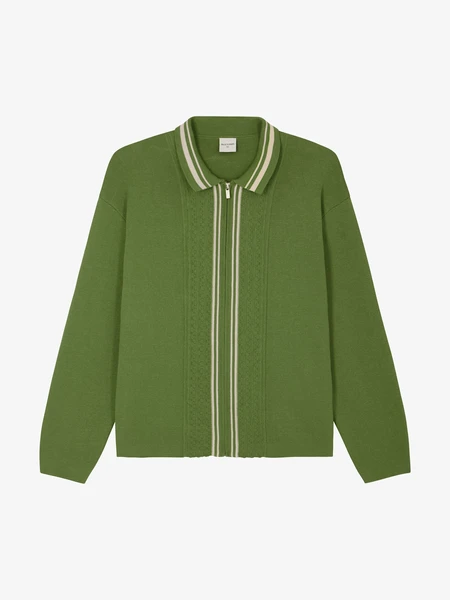 Le cardigan en maille vert émeraude