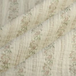 Tissu double gaze fleur en ligne beige écru