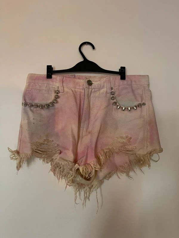 Short rose délavé à clous Unif