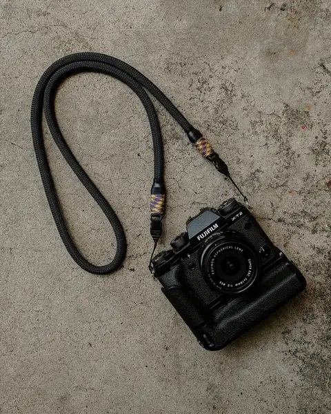 Black Camera neck strap with optech qd mini loop attachments