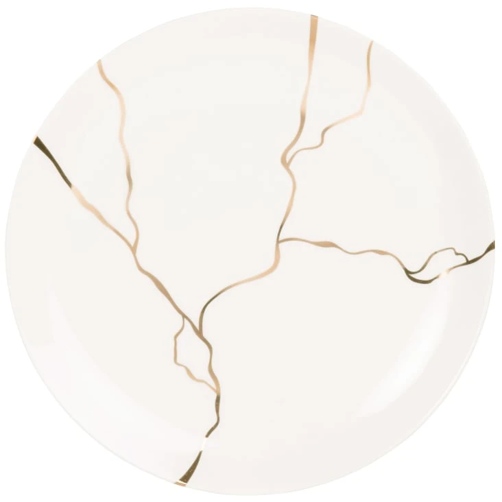 Assiette plate en grès blanc et doré