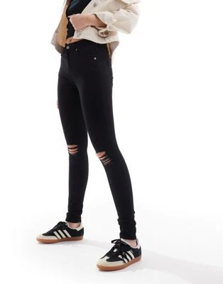 Dr Denim - Lexy - Jean skinny à taille mi-haute avec genoux déchirés - Noir délavé | ASOS