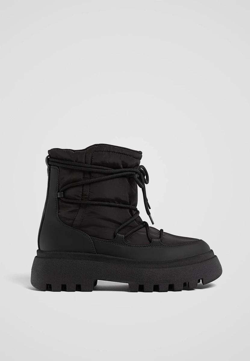 Bottines plates matelassées