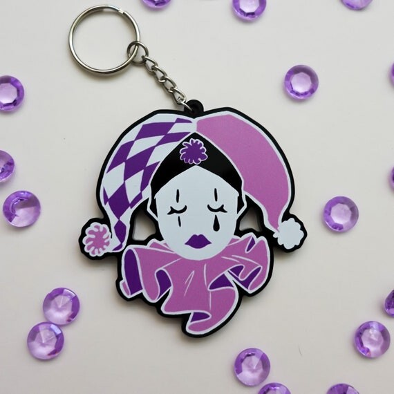 Charme acrylique noir de bouffon