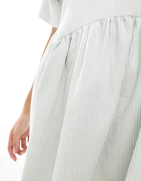 ASOS DESIGN Petite - T-shirt babydoll en velours côtelé avec couture à la taille - Menthe