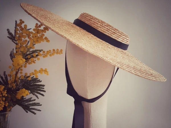 Wide brimmed natural straw boater hat