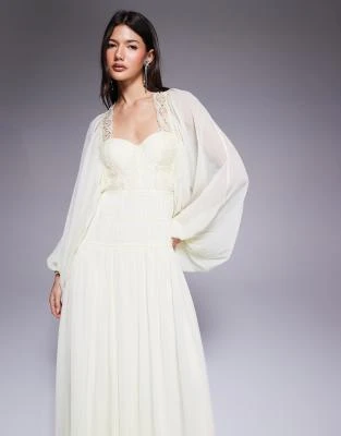 ASOS DESIGN - Robe longue style corset à manches longues et bordures en dentelle - Jaune