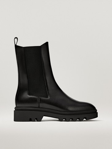 BOTTINES CHELSEA PLATES NOIRES À SEMELLE CRANTÉE