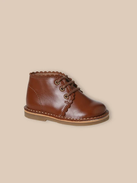 Bottines festonnées en cuir bébé