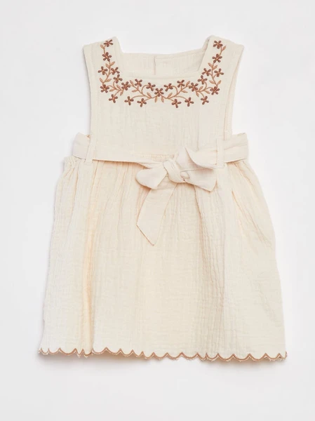 Robe en gaze de coton et broderies avec ceinture