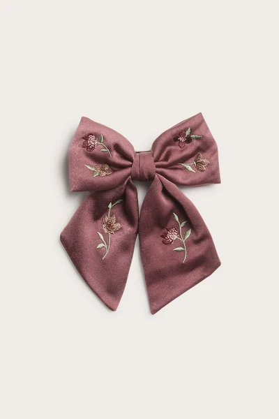 Satin bow with metal clip