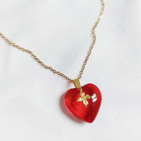 Devotion" upcycled necklace. 💋❤️ It has been made...