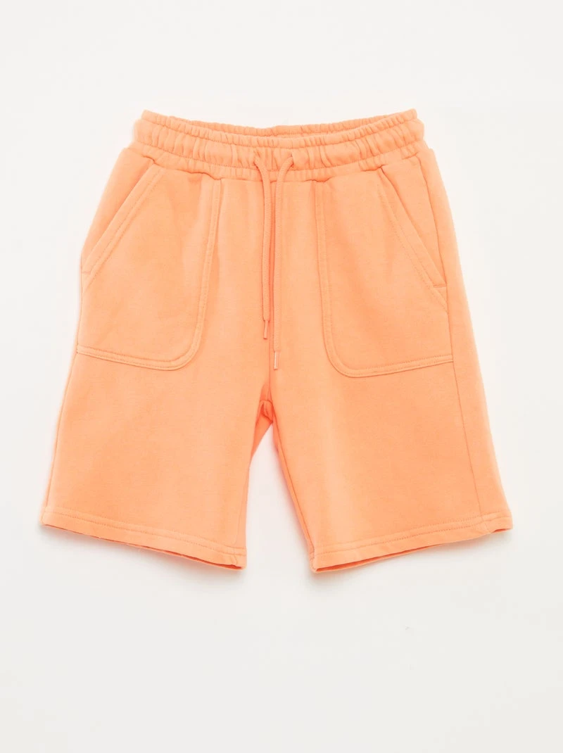 Short à grandes poches