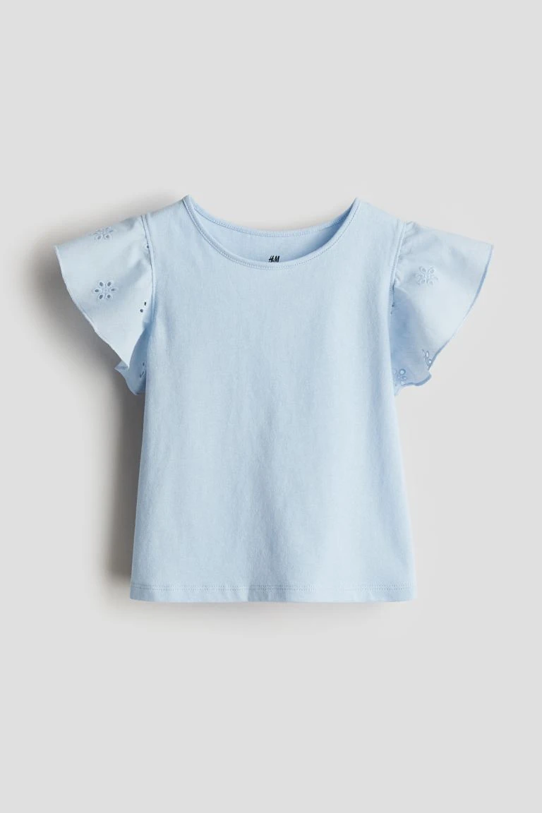 Top en jersey avec broderie anglaise