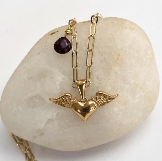 Winged heart pendant with ruby