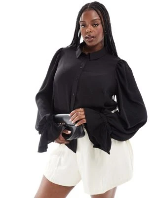 ASOS DESIGN Curve - Chemise souple à manches volumineuses avec poignets volantés - Noir | ASOS