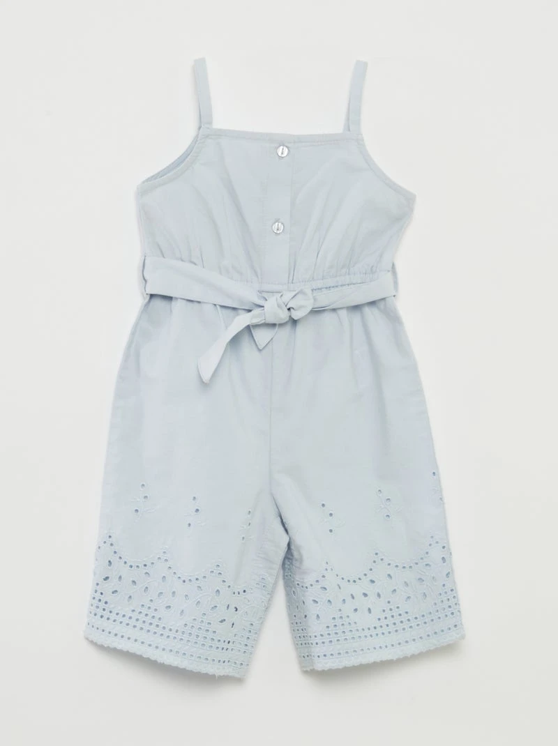 Combinaison longue à bretelles avec broderies à la base