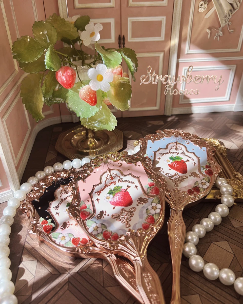 Miroir à main fraise rococo