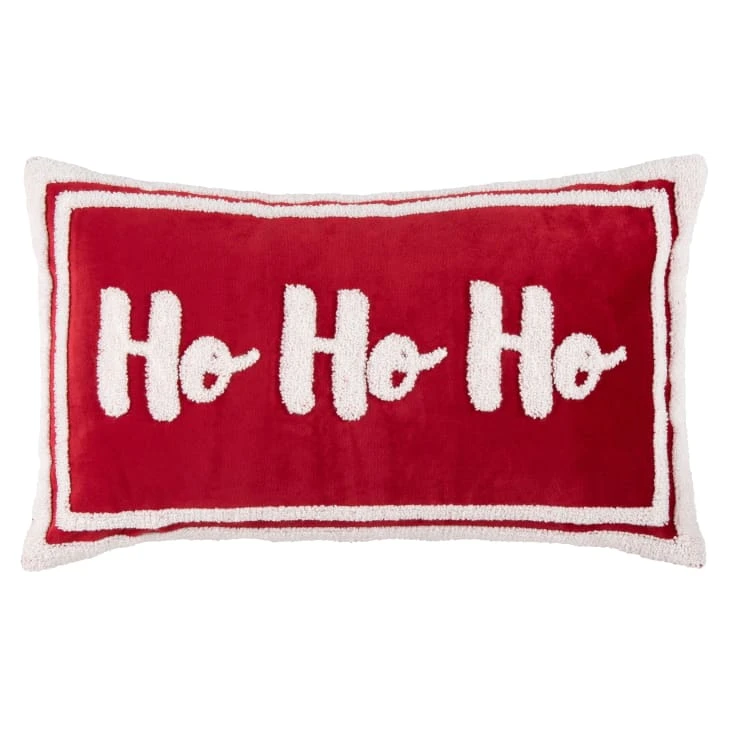 Housse de coussin rouge et blanche effet laine bouclée