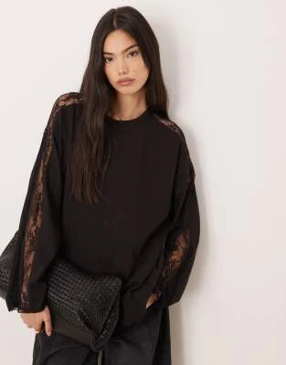 ASOS DESIGN - T-shirt manches longues avec empiècement en dentelle - Noir