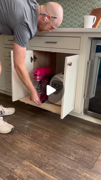 Sean @ Charleston Crafted on Instagram: "How I made a pull out cabinet drawer for all of our big appliances! This helps us to be able to reach the items in the back without having to pull three other appliances out first. This is an easy build that can be fit into any kitchen cabinet!-#kitchenremodel #kitchenrenovation #kitchencabinets #woodworking #diyhome #diyhomeimprovement #diyhomeprojects #diykitchen #kitchenhacks #kitchenhack"
