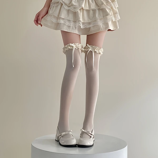Collants hauts blanc à noeuds 