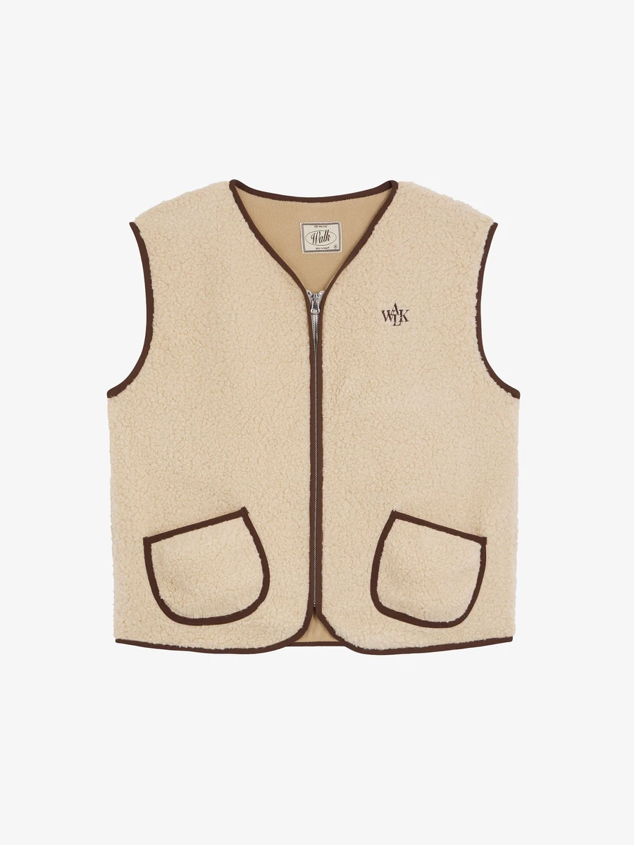 La veste de berger beige sans manches