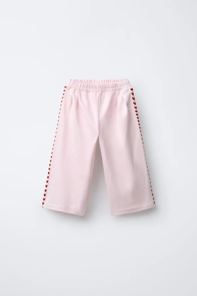 PANTALON À PINCES CŒURS