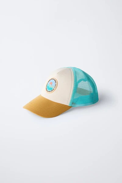 CASQUETTE EN RÉSILLE AVEC PIÈCE EFFET GOMME