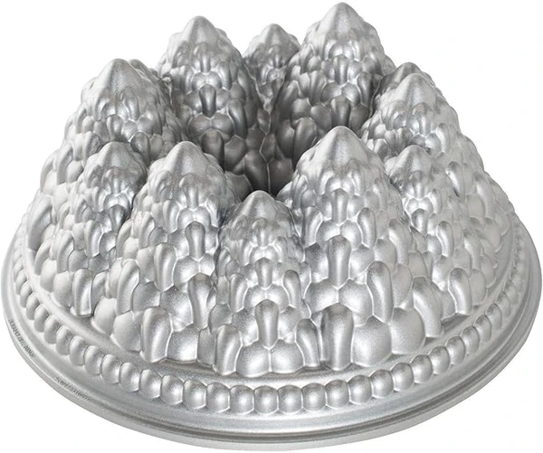 Nordic Ware - Moule à gâteau, moule à pâtisserie - Moule à gâteau Bundt Forêt de sapins Silver - Revêtement antiadhésif - Fonte d'aluminium