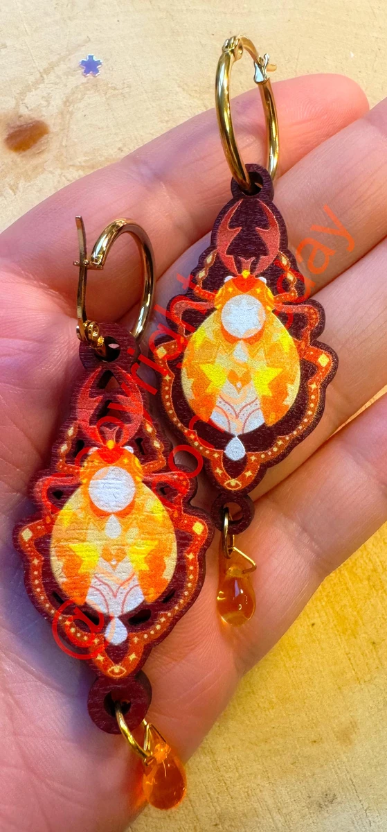 Boucle d'oreille scarabée