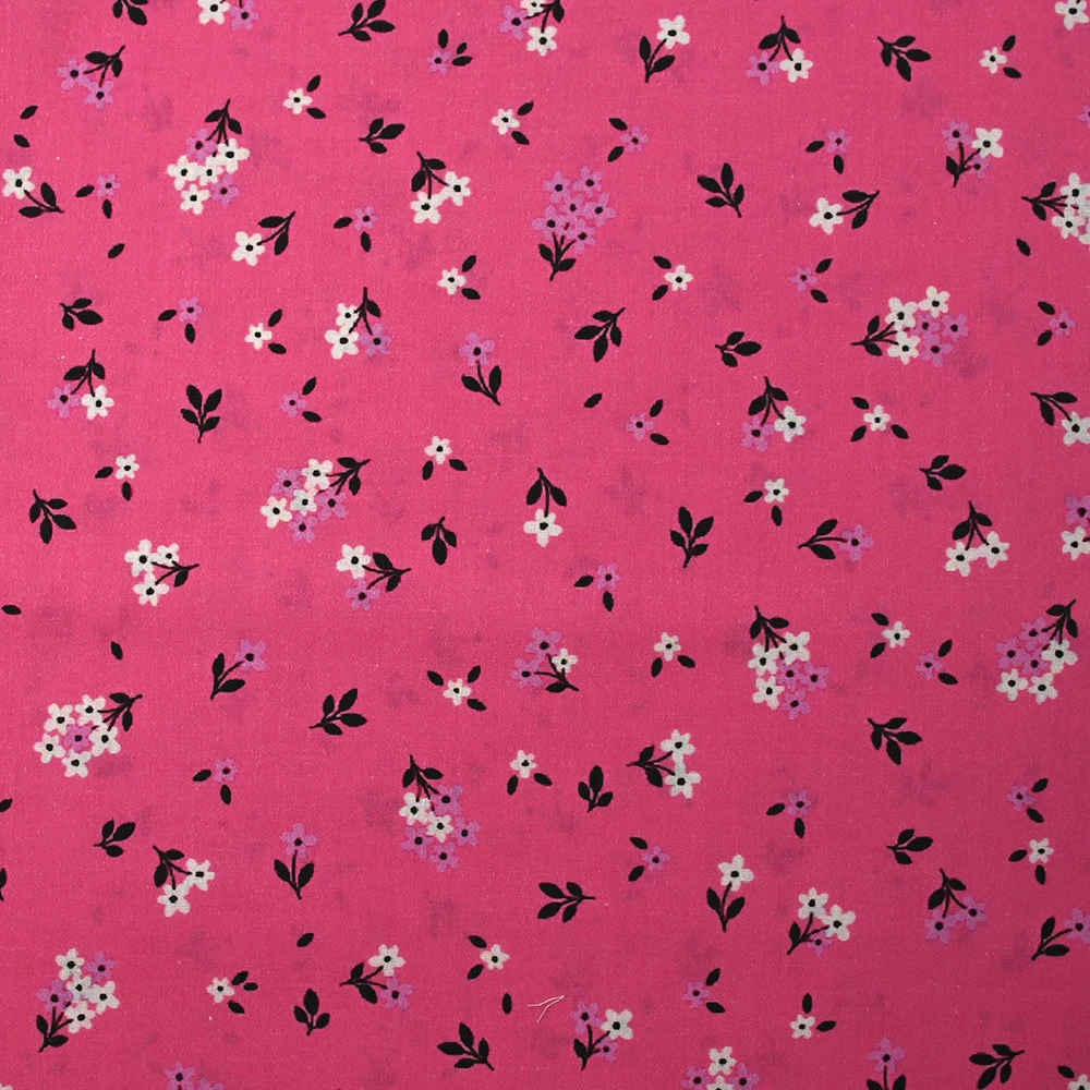 Popeline de coton imprimée fleurs printanières fond rose barbie