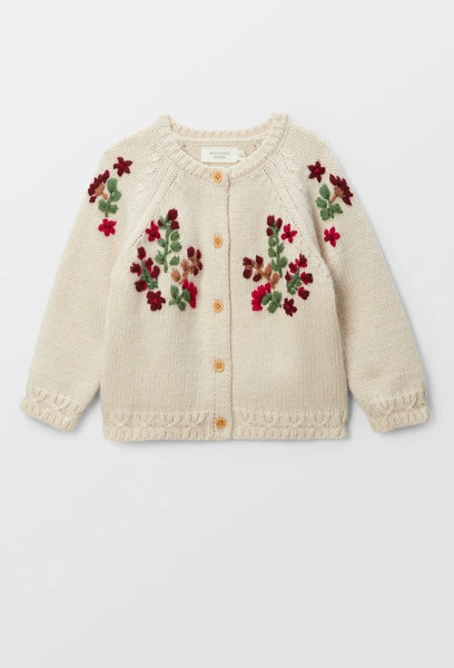 Cardigan tricot brodé contenant de la laine