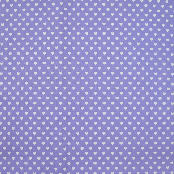 Popeline de coton imprimée petits cœurs fond parme