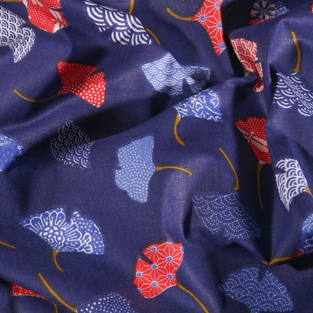 Tissu Coton imprimé Arty Ginkgo rouges et bleus sur fond Bleu - Par 10 cm