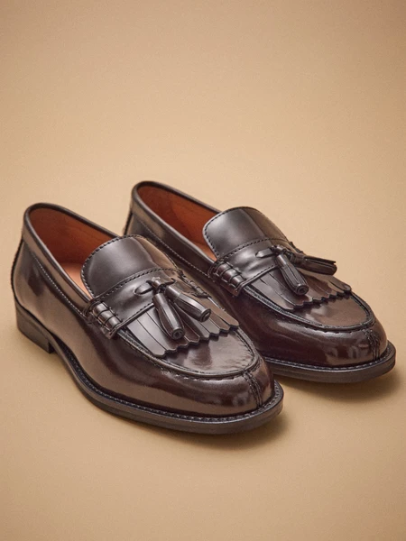 Mocassins frange et pompons cuir femme