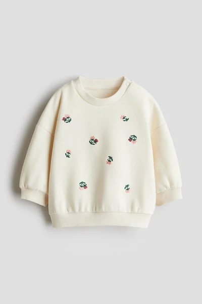 Sweat avec motif - Crème/fleuri - ENFANT | H&M FR